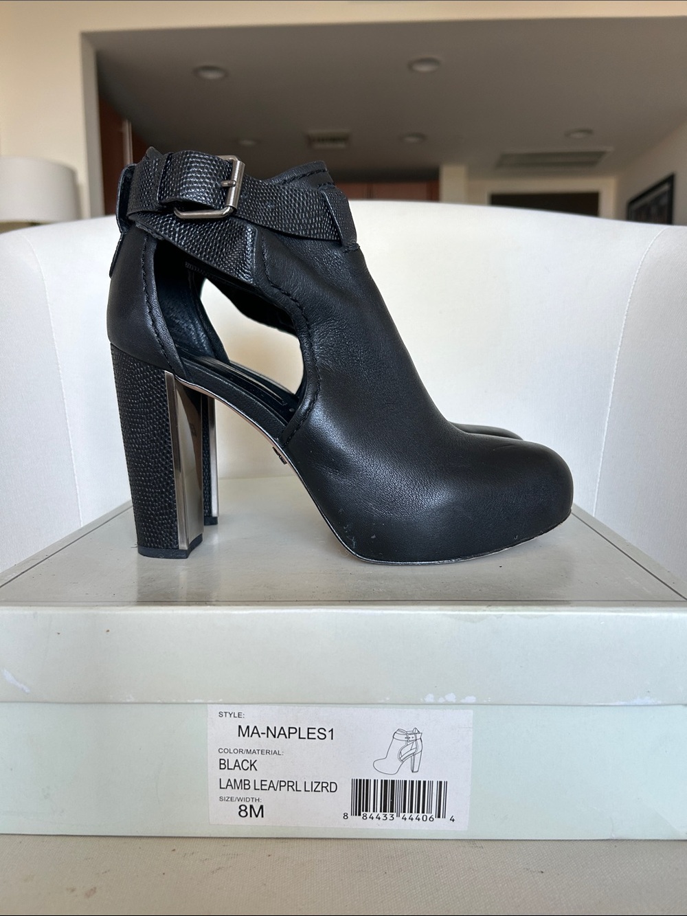 BCBGMaxAzria Black Leather Cutout Ankle Boot with Buckle